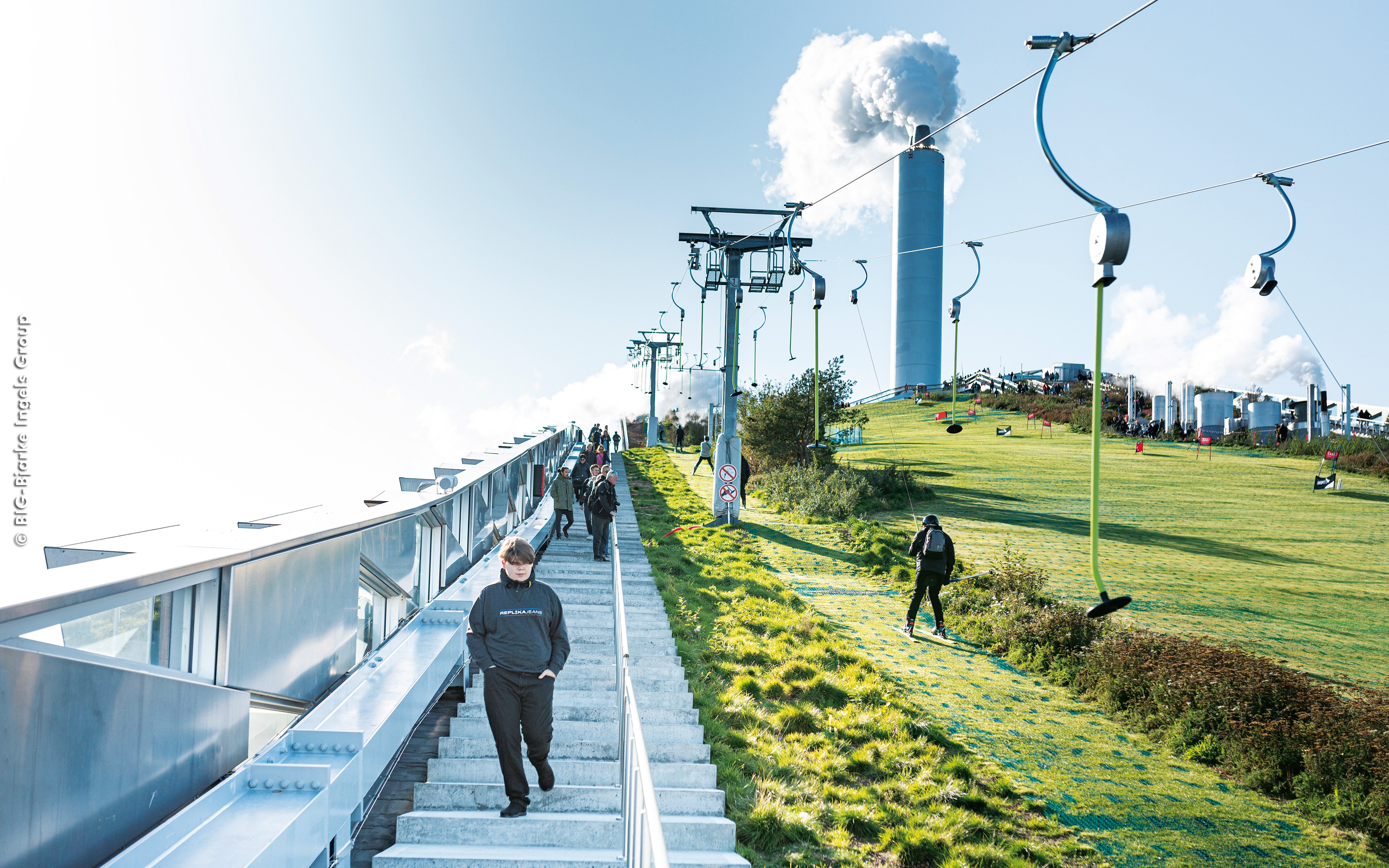 Pitched green roof with stairs, lawn and a vegetated ski slope